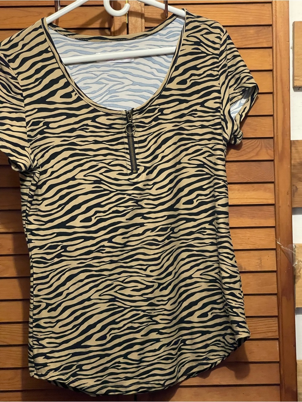 Women’s Black and Tan Zebra Print Short Sleeve Top with Zip Detail
